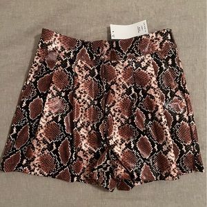 Miss Selfridge leather snake print shorts.